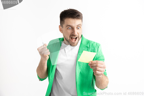 Image of Young man with a surprised expression won a bet