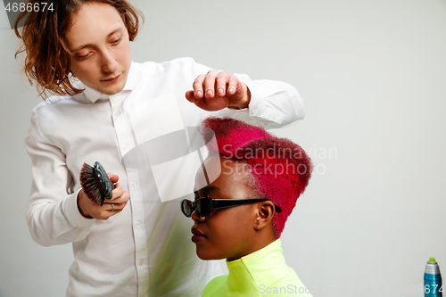 Image of Picture showing adult woman at the hair salon