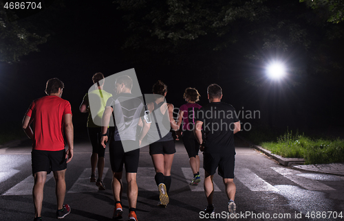 Image of runners team on the night training