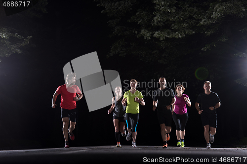 Image of runners team on the night training