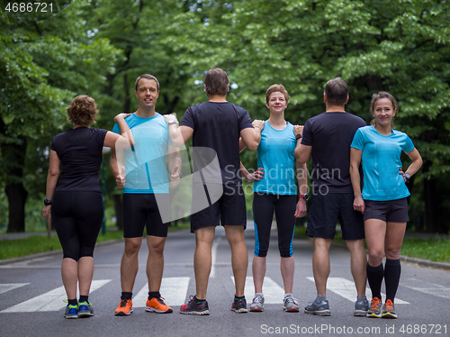 Image of portrait of runners team on morning training
