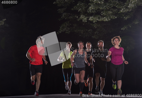 Image of runners team on the night training