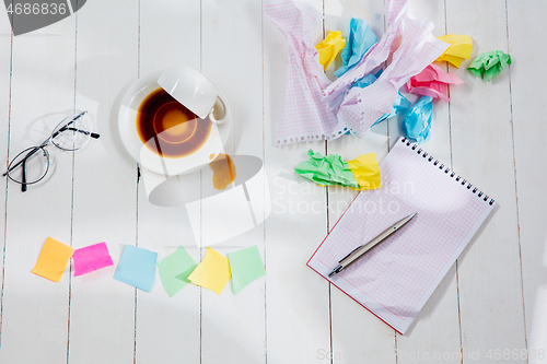 Image of Message in wooden cubes on a desk background.