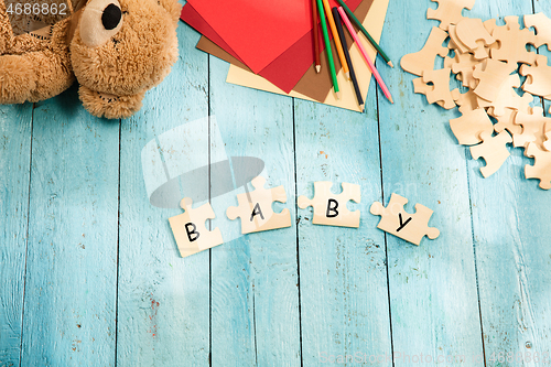 Image of Stationery and word BABY made of letters