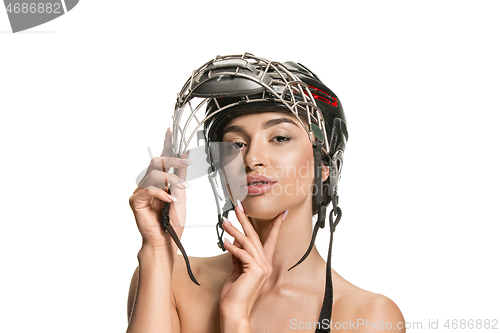 Image of Female hockey player close up helmet and mask