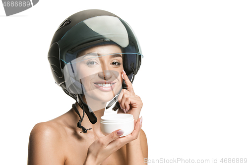 Image of Portrait of attractive woman in motorbike helmet