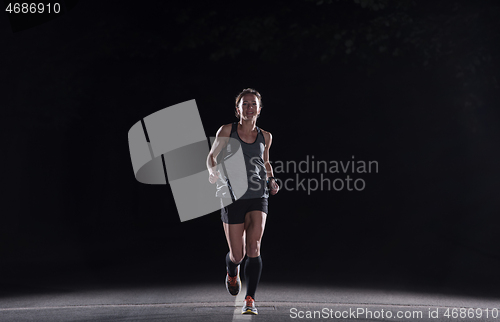 Image of female runner training for marathon