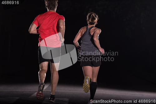 Image of runners team on the night training