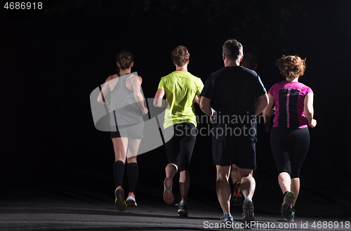 Image of runners team on the night training