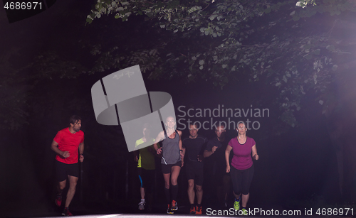 Image of runners team on the night training