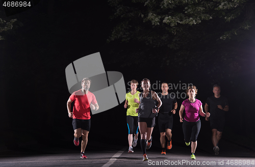 Image of runners team on the night training