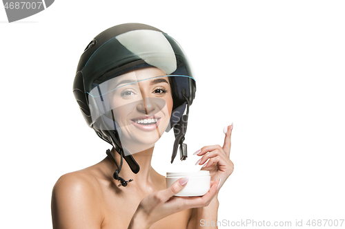 Image of Portrait of attractive woman in motorbike helmet
