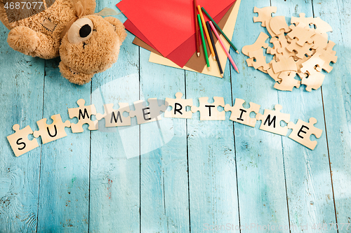 Image of Stationery and words SUMMER TIME made of letters