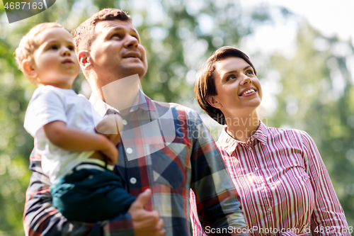 Image of happy family at summer park