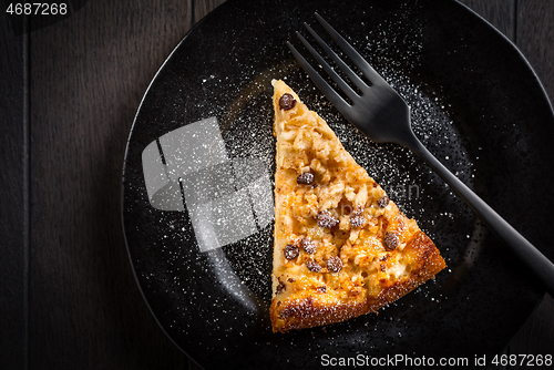 Image of Piece of homemade apple pie with chocolate pieces for Thanksgiving