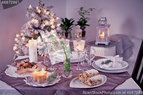 Image of Table setting for celebration Christmas and New Year Holidays. Festive table at home. 