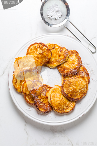 Image of Homemade low calarie curd cheese pancakes on white plate