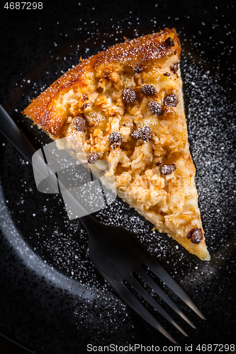 Image of Piece of homemade apple pie with chocolate pieces for Thanksgiving