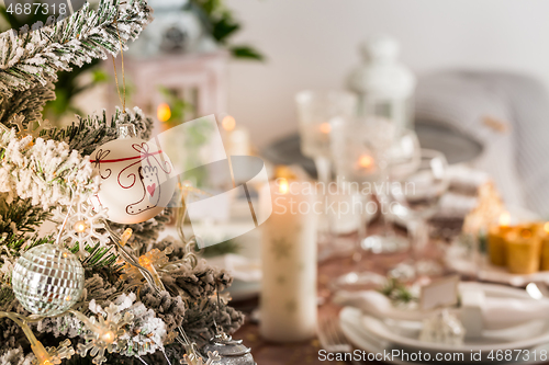 Image of Table setting for celebration Christmas and New Year Holidays. Festive table at home. 