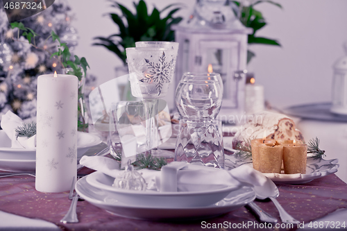 Image of Table setting for celebration Christmas and New Year Holidays. Festive table at home. 