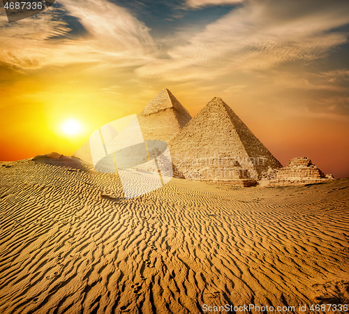 Image of Pyramid in sand desert