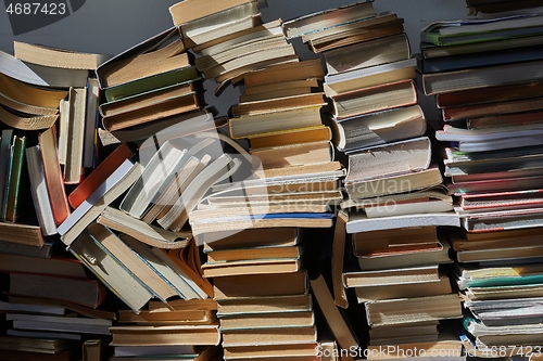 Image of Wall of books piled up