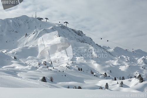 Image of Mountain skiing slopes, snowy Alpine landscape