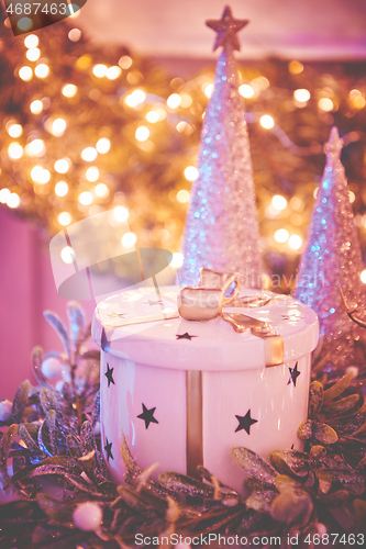 Image of Closeup of Christmas tree decorations. Selective focus with retro faded colors