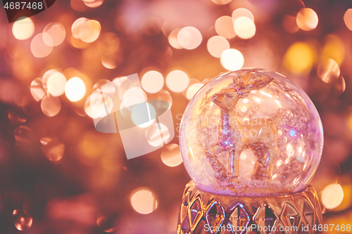 Image of Closeup of Christmas tree decorations. Selective focus with retro faded colors