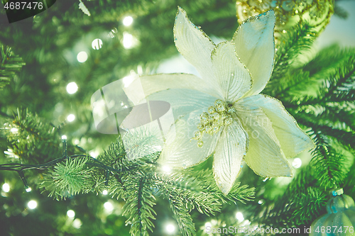 Image of Closeup of Christmas tree decorations. Selective focus with retro faded colors