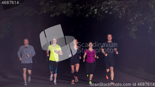 Image of runners team on the night training