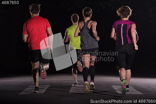 Image of runners team on the night training