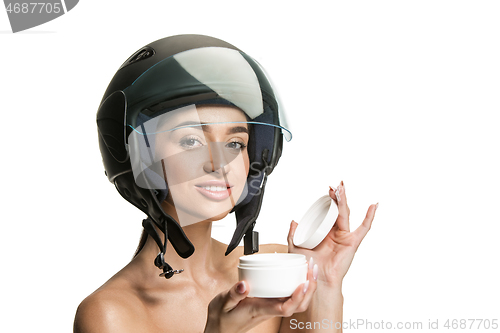 Image of Portrait of attractive woman in motorbike helmet
