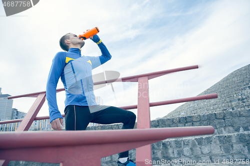 Image of Man on city background at morning. Healthy lifestyle concept.