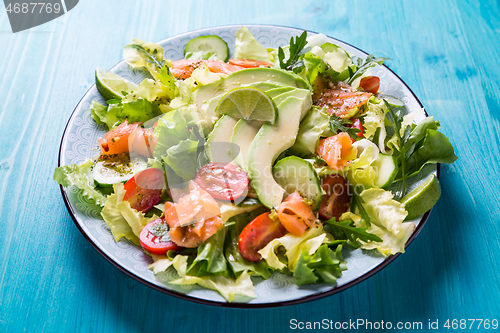 Image of Healthy salad with smoked samlmon and avocado