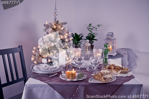 Image of Table setting for celebration Christmas and New Year Holidays. Festive table at home. 