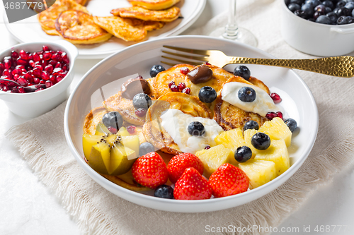 Image of Homemade low calarie curd cheese pancakes with fruit salad