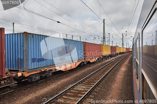 Image of Freight train viewed from passanger window