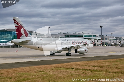 Image of Plane taxiing at airport