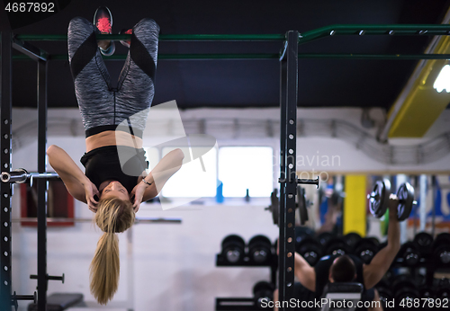 Image of woman doing abs exercises