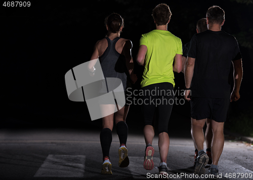 Image of runners team on the night training