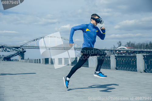 Image of Man running on city background at morning.