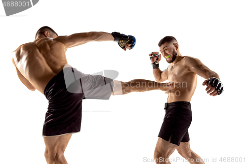 Image of Two professional boxers boxing isolated on white studio background