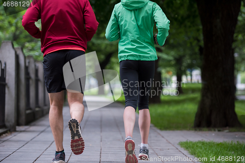 Image of jogging couple on morning training