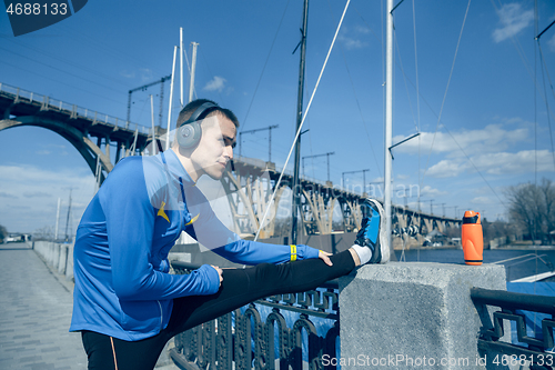 Image of Man running on city background at morning