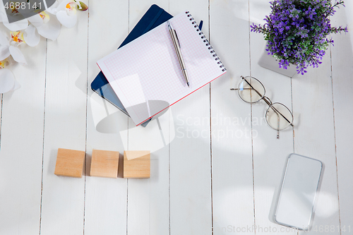 Image of Message at wooden cubes on a desk background.