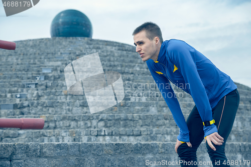 Image of Man on city background at morning. Healthy lifestyle concept.