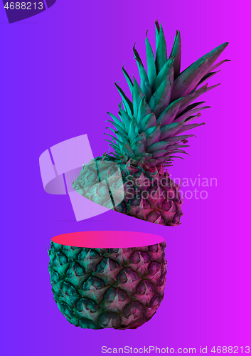 Image of A neon pineapple. Modern design. Contemporary art collage.
