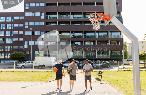 Image of group of male friends going to play basketball