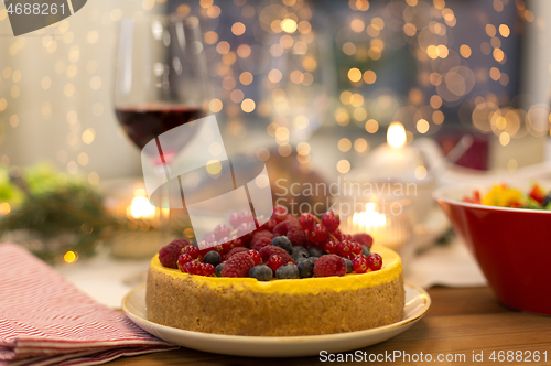 Image of cake and other food on christmas table at home